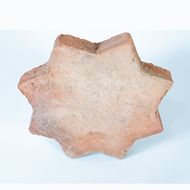 Baldosa artesanal a medida de barro cocido artesanal. suelos con forma de estrella